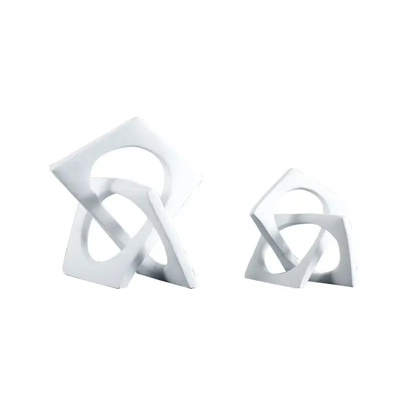 Abstract white ceramic geometric cross square ring bookends with interlocking design for living room decorbites geometric cross