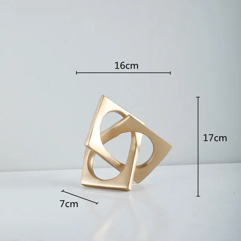 Gold-colored geometric cross square ceramic ring bookends with interlocking square shapes for living room decorbites decor