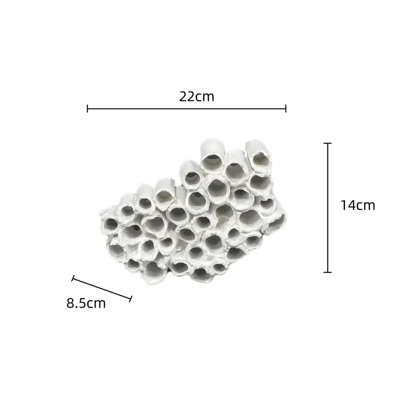 Abstract white ceramic coral reef decoration featuring honeycomb mesh conduit design for living room decor 22cm x 14cm x 8.5cm