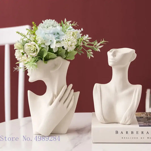 Abstract white ceramic vase portrait ornament shaped like a half face woman holding artificial flowers for living room decor