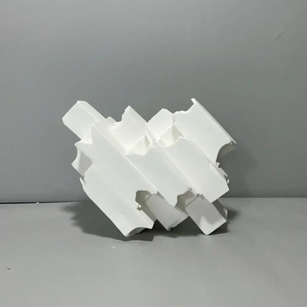 Abstract white decorbites geometric ceramics flower vase with layered angular segments and matte finish for living room