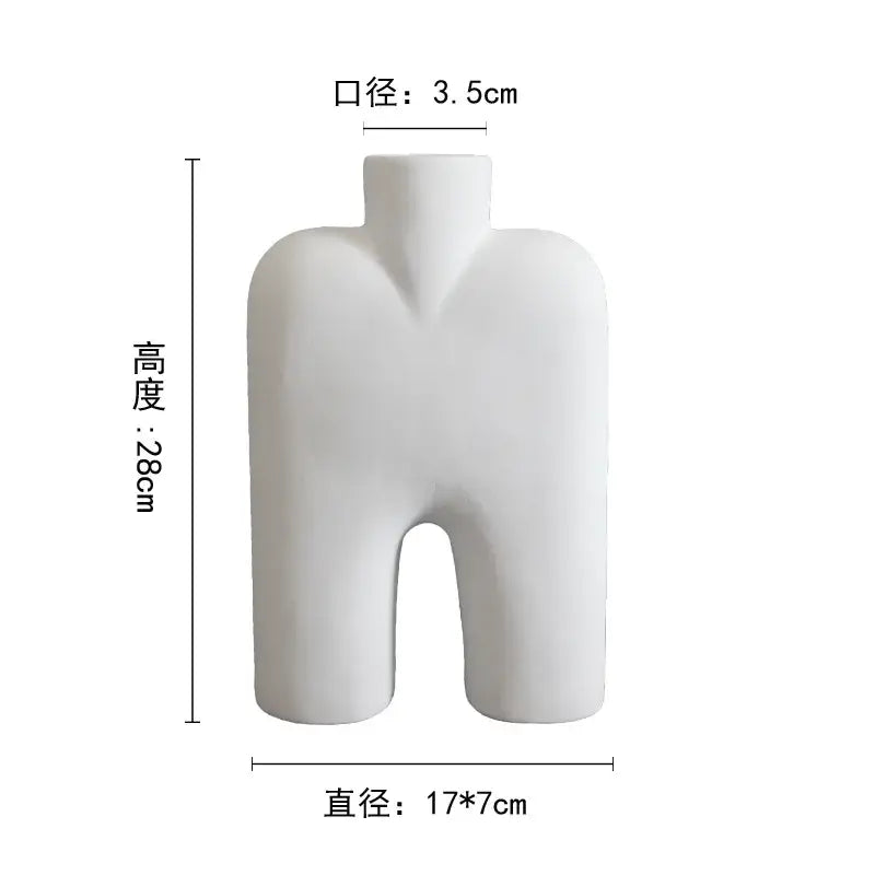 Abstract white geometric ceramic vase shaped like a minimalist human torso for modern living room decorbites ceramic vase