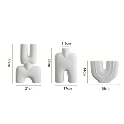 Three white minimalist geometric ceramic vases with abstract human-like silhouettes for living room decorbites ceramic vase