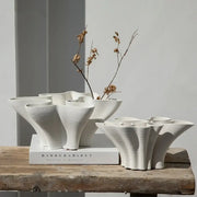 Abstract white geometric fold ceramic vase with organic flowing forms and textured surfaces for living room decorbites geometric fold decor
