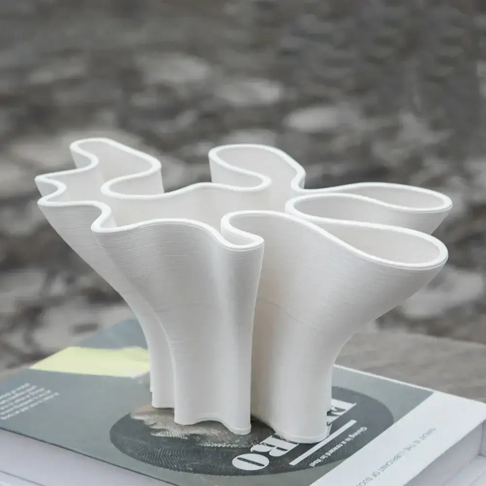Abstract white geometric fold ceramic vase with flowing organic curves and layered branching design for living room decorbites geometric fold