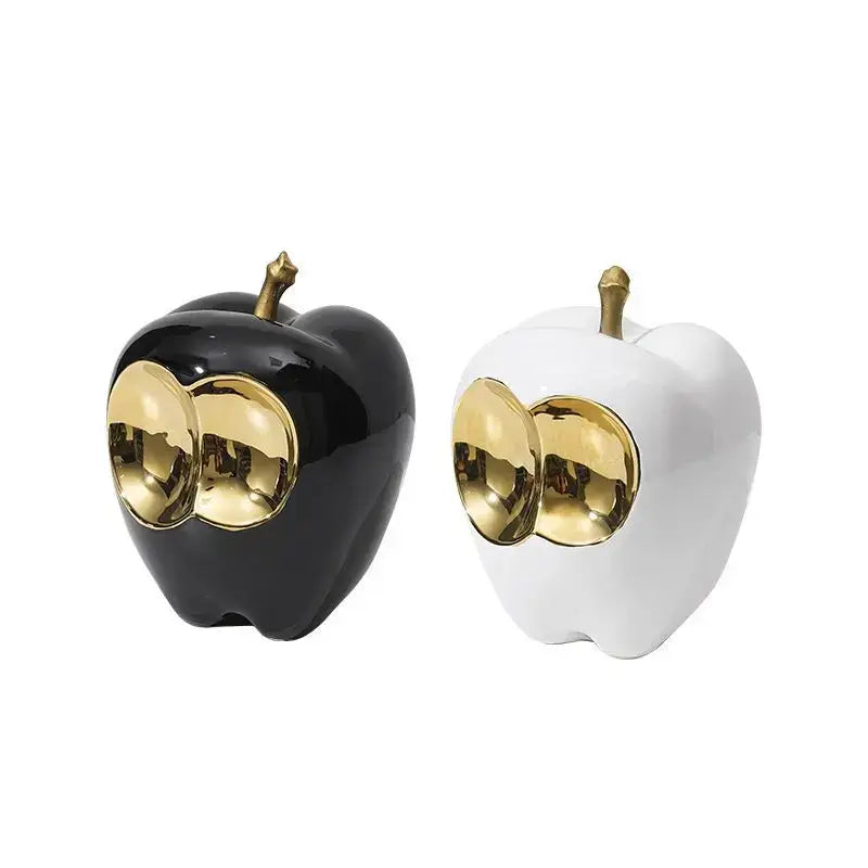 Abstract white and gold ceramic golden apple sculpture with black and white accents for living room decor