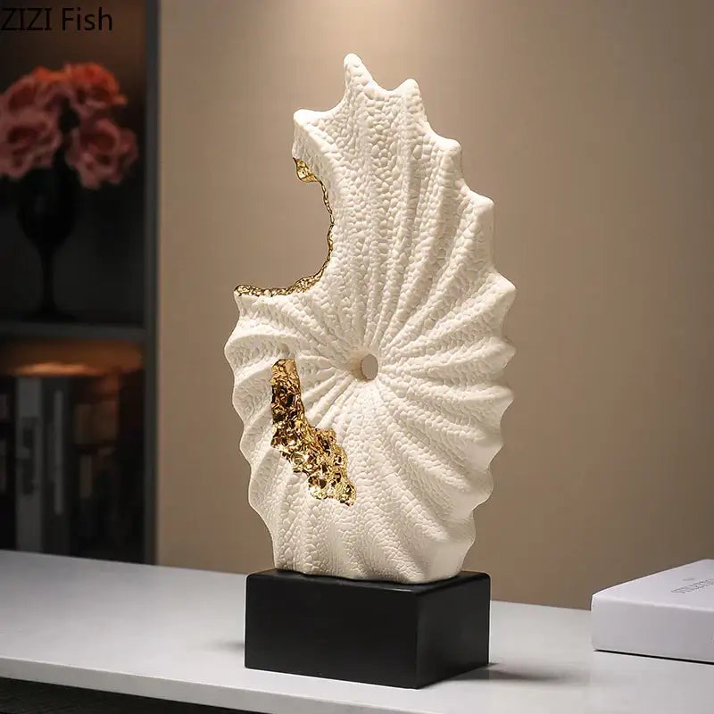 Abstract white and gold gilded ceramic landscape seashell sculpture on black base for living room decor