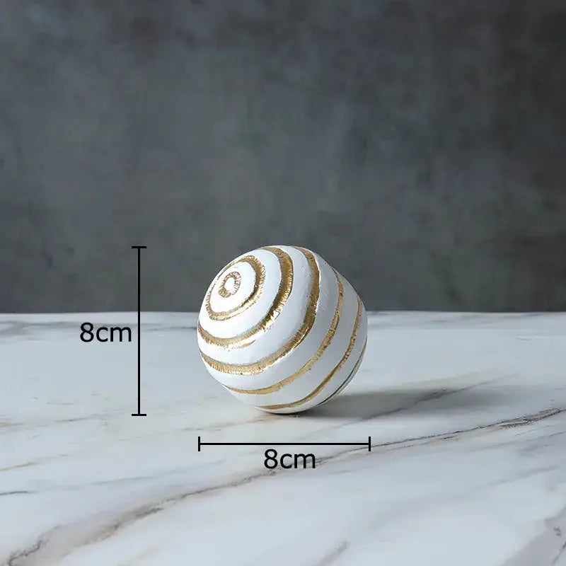 A white ceramic golden texture ball with gold spiral stripes 8cm diameter for living room decor