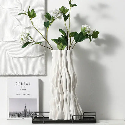 Abstract white irregular trunk fold ceramic vase with textured wavy surface for living room decor