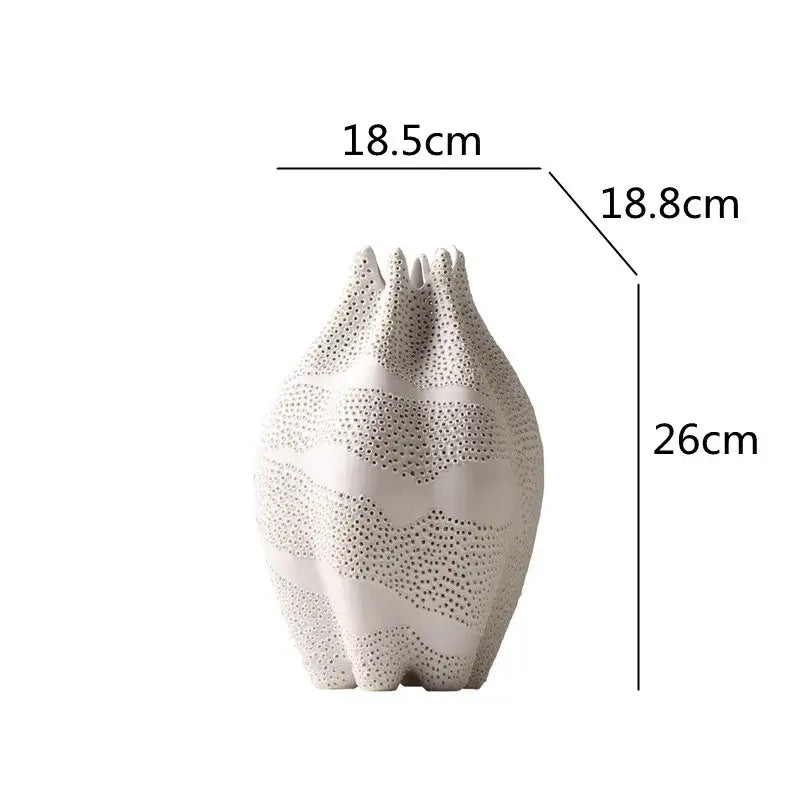 Abstract white textured ceramic vase with dot pattern perforations for elegant living room decorbites dot pattern decor