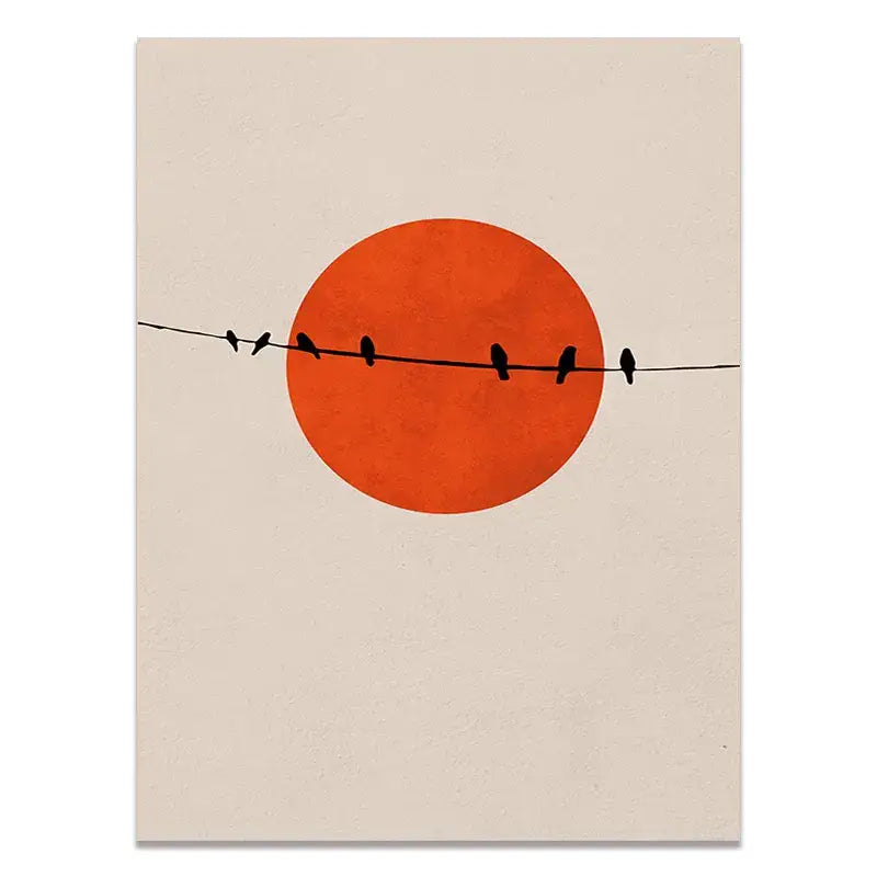 Minimalist nordic style canvas print with bold orange sun and black bird silhouettes on beige winter morning landscape background
