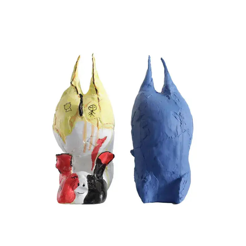 Two hand-painted ceramic cartoon pig handicrafts in vibrant yellow with red accents and solid blue for bedroom decorbites decor