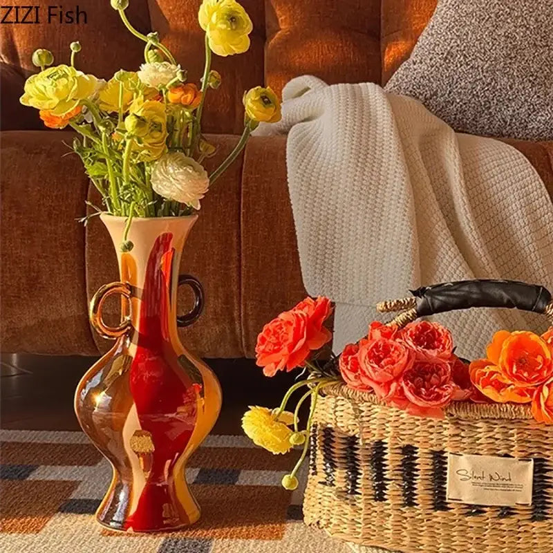Glossy hand-blown glass vase with red and amber gradient and gold handles for ceramic vase plant pots decor