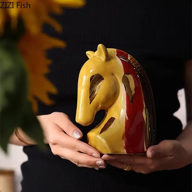Glossy ceramic vase plant sculpture in yellow and red with cut-out horse head design for living room decor