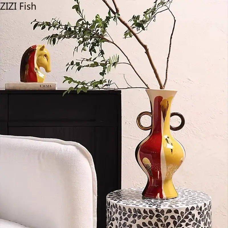 A vibrant red and yellow ceramic vase plant with gold ring handles ideal for living room decor and vase plant pots
