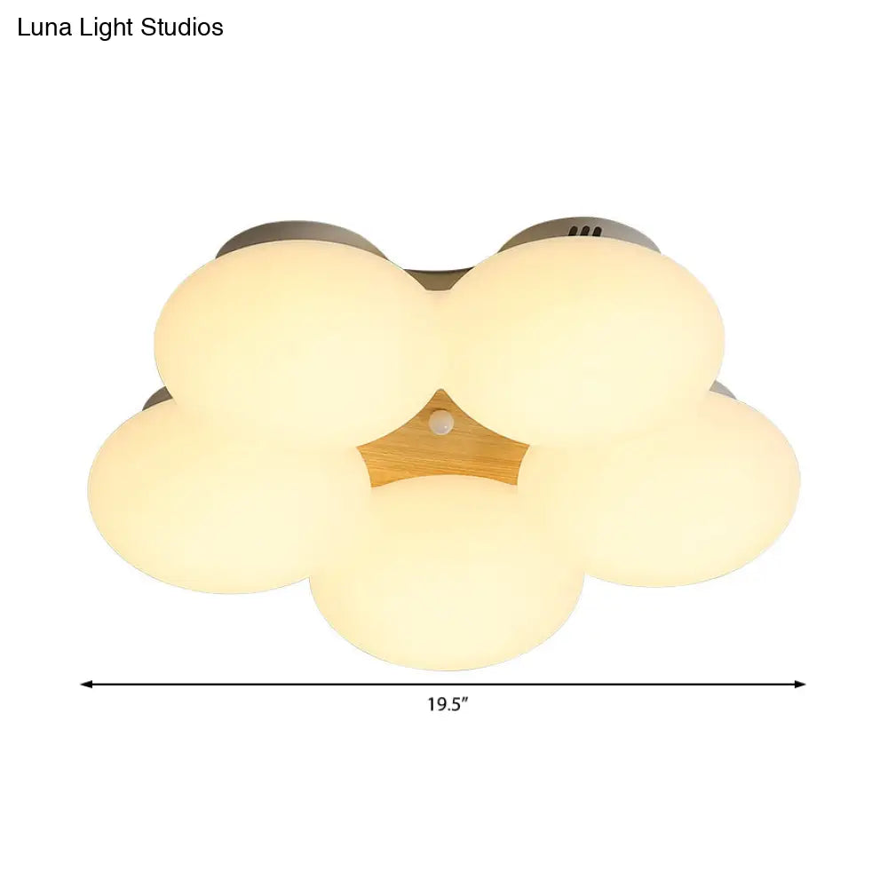 وحدة إضاءة LED نورديك من DecorBites™ مصنوعة من الأكريليك بتصميم زهور ولمسة نهائية بيضاء/خشبية