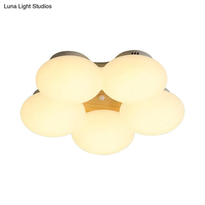 وحدة إضاءة LED نورديك من DecorBites™ مصنوعة من الأكريليك بتصميم زهور ولمسة نهائية بيضاء/خشبية