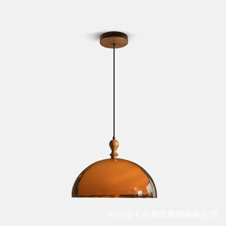Warm amber glass dome acrylic pendant light with dark wood lampshade and wooden ceiling mount with decorative finial