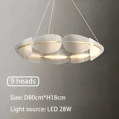 Modern white DecorBites acrylic ring chandelier with nine circular led heads and sleek metallic accents for dining rooms