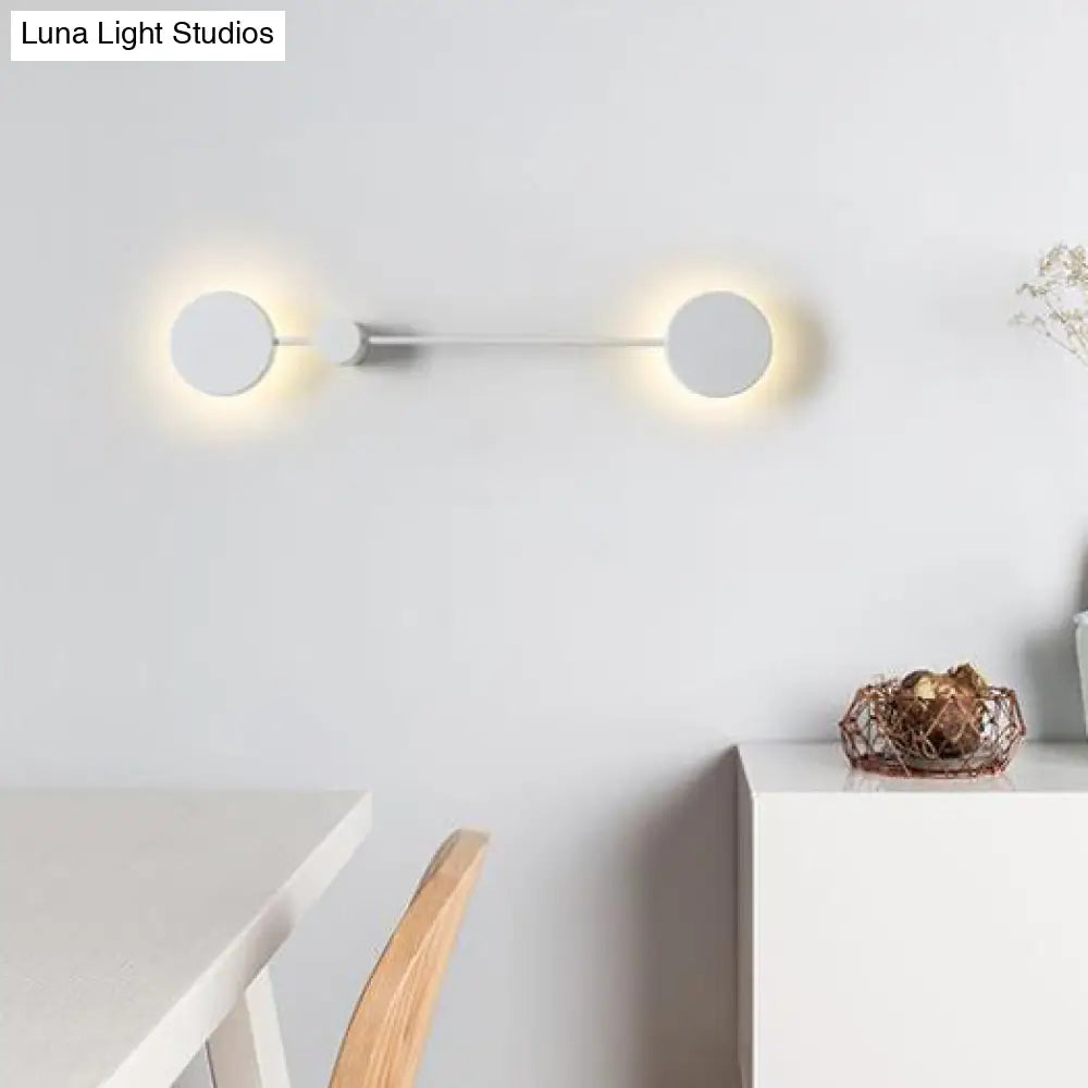 Aplique de pared LED DecorBites™ con pantalla acrílica en blanco y negro con luz cálida/blanca.