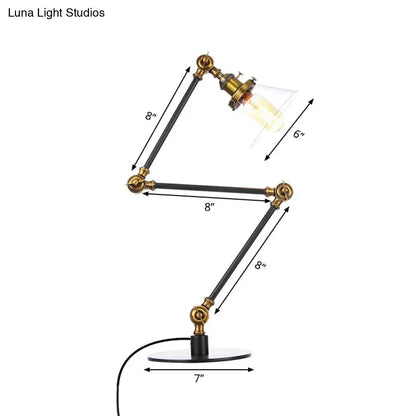 Lámpara de mesa industrial con brazo ajustable y pantalla de cristal transparente - Acabado negro/latón