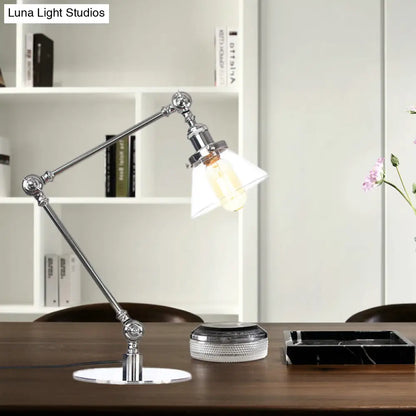 Lámpara de mesa industrial con brazo ajustable y pantalla de cristal transparente - Acabado negro/latón