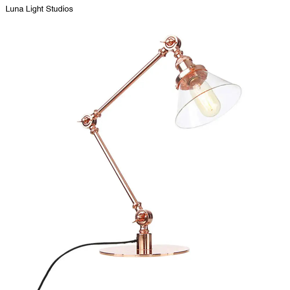 Lámpara de mesa industrial con brazo ajustable y pantalla de cristal transparente - Acabado negro/latón