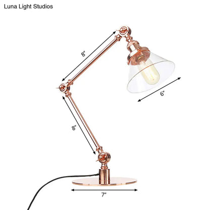 Lámpara de mesa industrial con brazo ajustable y pantalla de cristal transparente - Acabado negro/latón