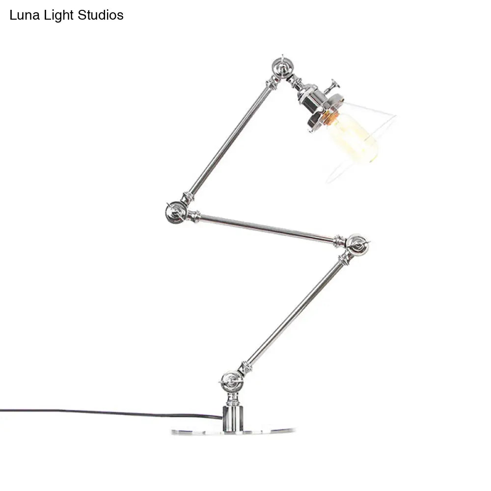 Lámpara de mesa industrial con brazo ajustable y pantalla de cristal transparente - Acabado negro/latón