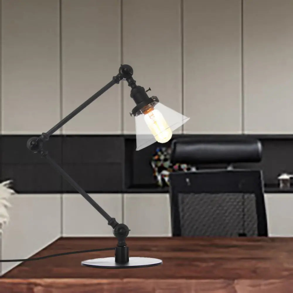 Lámpara de mesa industrial con brazo ajustable y pantalla de cristal transparente - Acabado negro/latón