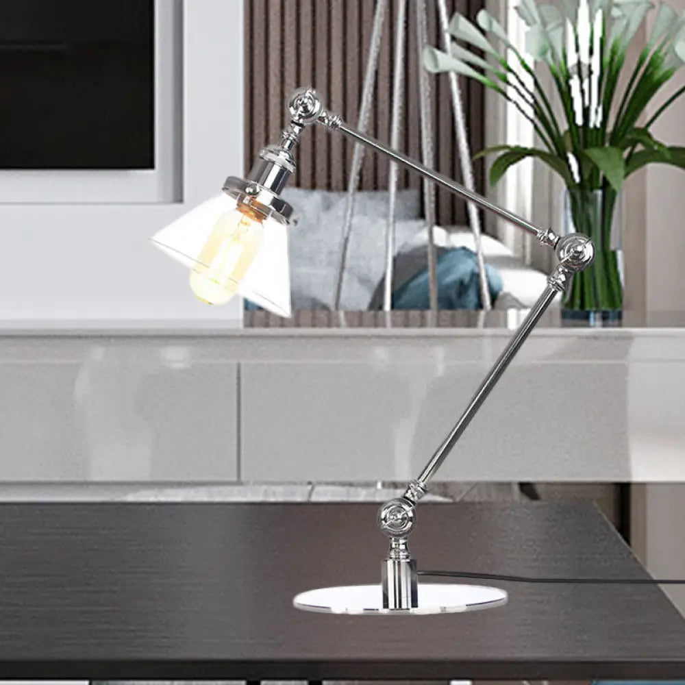 Lámpara de mesa industrial con brazo ajustable y pantalla de cristal transparente - Acabado negro/latón