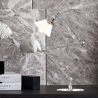 Lámpara de mesa industrial con brazo ajustable y pantalla de cristal transparente - Acabado negro/latón