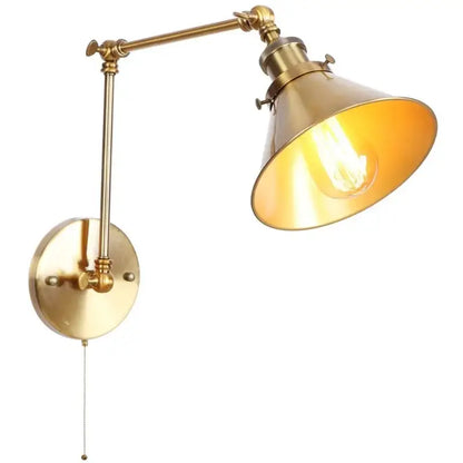 Adjustable brass gold long arm wall sconce with conical shade and exposed filament bulb for bedroom reading light decorbites gold long