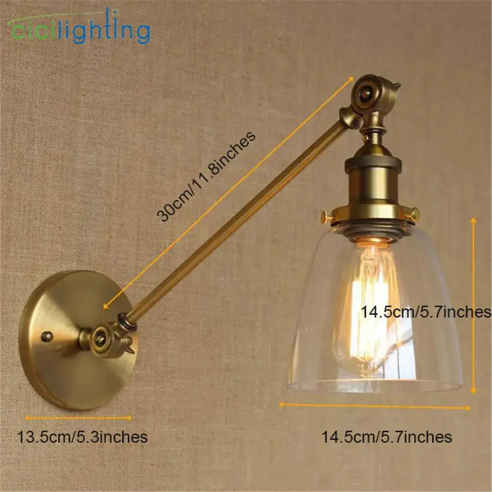 Adjustable brass wall sconce with clear glass dome and exposed filament bulb ideal as bedroom wall lamp decorbites brass copper