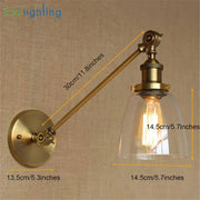 Adjustable brass wall sconce with clear glass dome and exposed filament bulb ideal as bedroom wall lamp decorbites brass copper