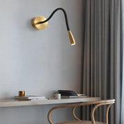 Adjustable nordic bronze wall lamp with gold finish, black flexible gooseneck arm, and adjustable light head by decorbites