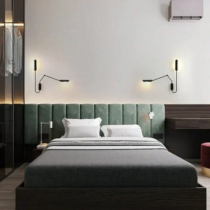 Adjustable retro wall lamp in black metal mounted above green velvet tufted headboard with dark wood frame decorbites wall lamp