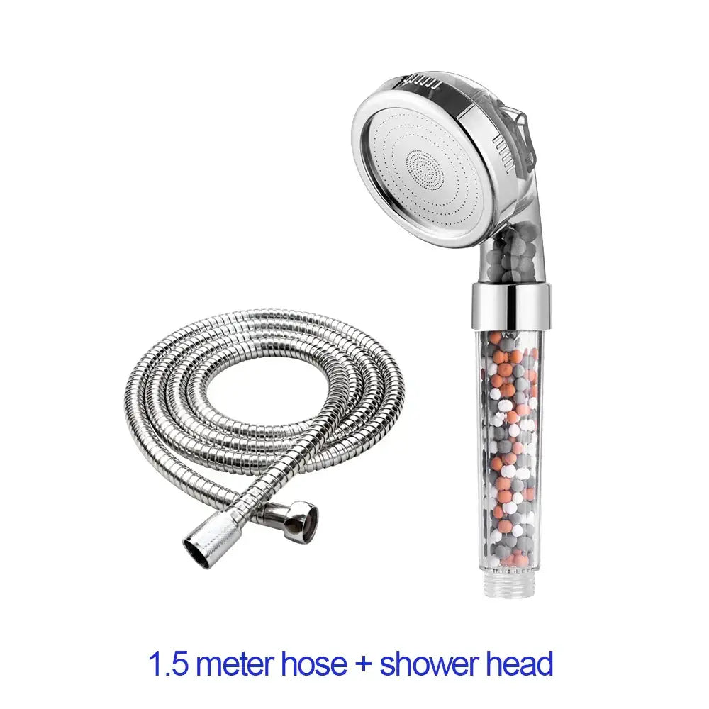 Adjustable shower head with chrome accents features a silver-toned body filled with multicolored filter beads and flexible hose