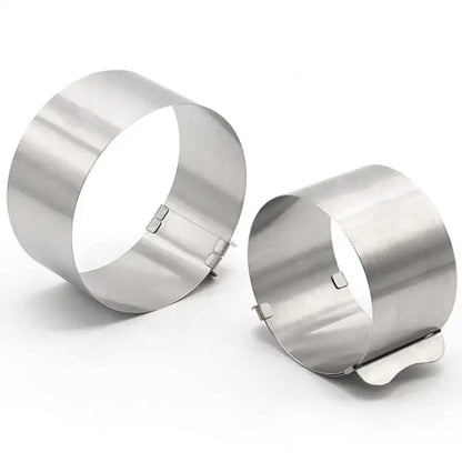 Two sleek silver stainless steel cake rings with hinged clasps from decorbites adjustable stainless steel slicer set