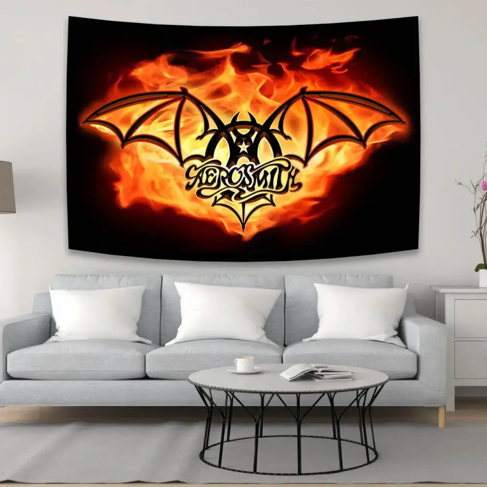 Aerosmith band tapestry with bold black and orange flame bat design for band tapestry room decor by decorbites aerosmith band