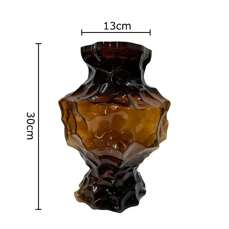 Aesthetic amber irregular glass vase with textured sculpted surface and darkened base by decorbites irregular glass