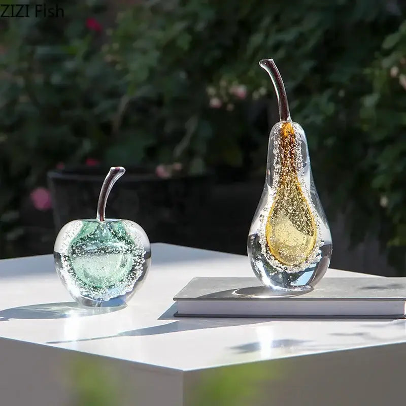 Clear glass fruit sculpture with green and gold bubble design as a sculpture desk ornament for bedroom decor