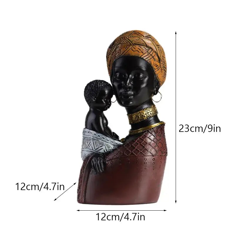 A glossy black and brown resin african exotic black mother and child figurine with gold detailing for decorbites decor