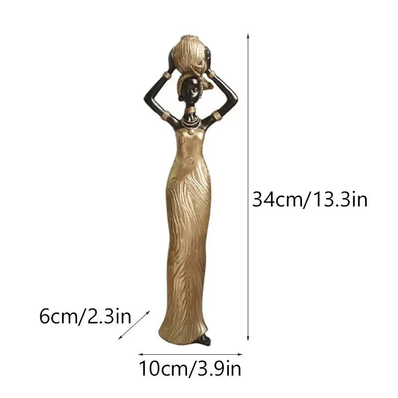 Tall slender decorbites black woman resin figurine in gold-toned dress carrying woven basket for living room decor
