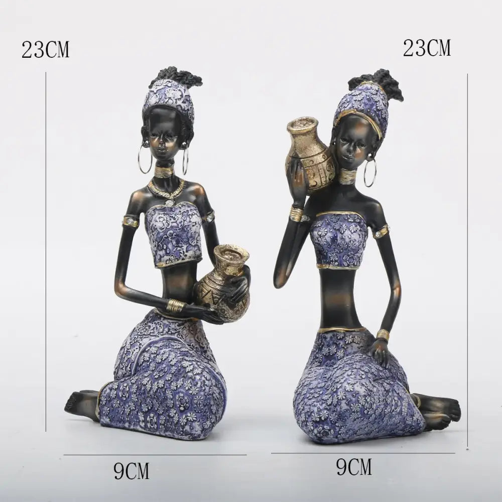 Two 23cm tall resin african woman sculptures in purple and gold floral attire for decorbites african woman living room decor
