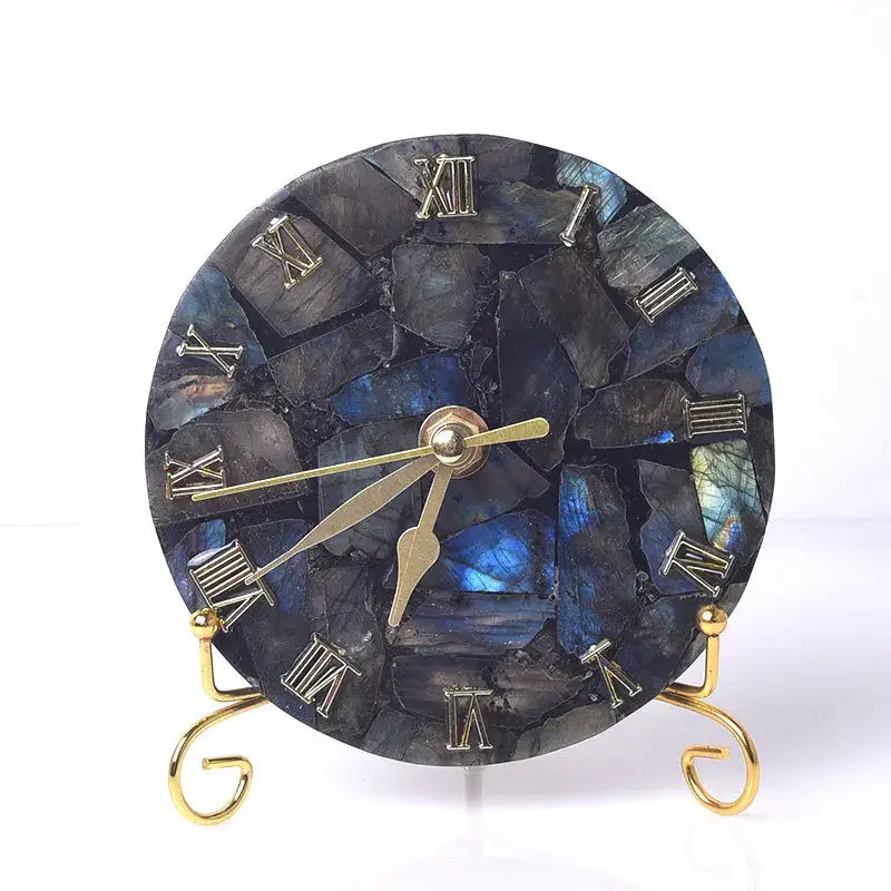 A round agate stone table clock with dark blue labradorite face gold roman numerals and ornate brass legs decorbites agate stone digital clock