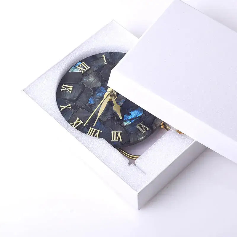A luxury round agate stone digital clock with a dark iridescent shell face and gold roman numerals for living room decor