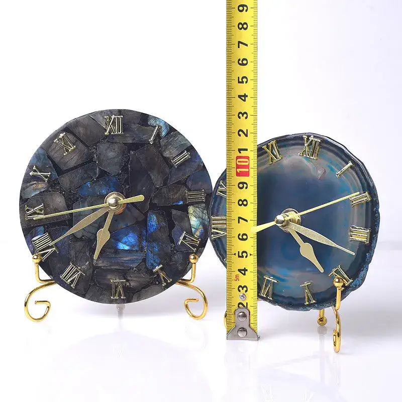 Two decorative agate stone clocks with gold roman numerals and hands for luxury living room decor by decorbites digital clock