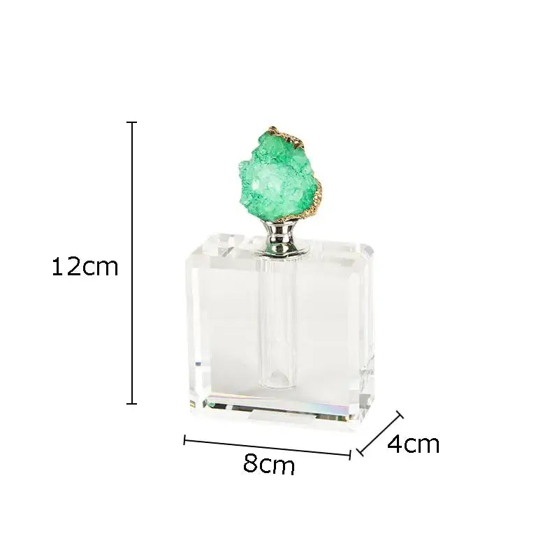 A clear acrylic square agate stone perfume bottle with silver cap and green crystal stopper for essential oils decor