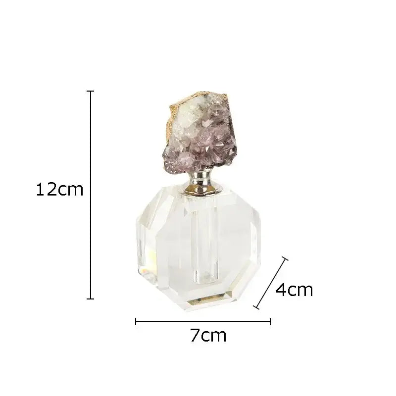 A clear faceted glass agate stone perfume bottle with silver neck and purple amethyst stopper for essential oils decor